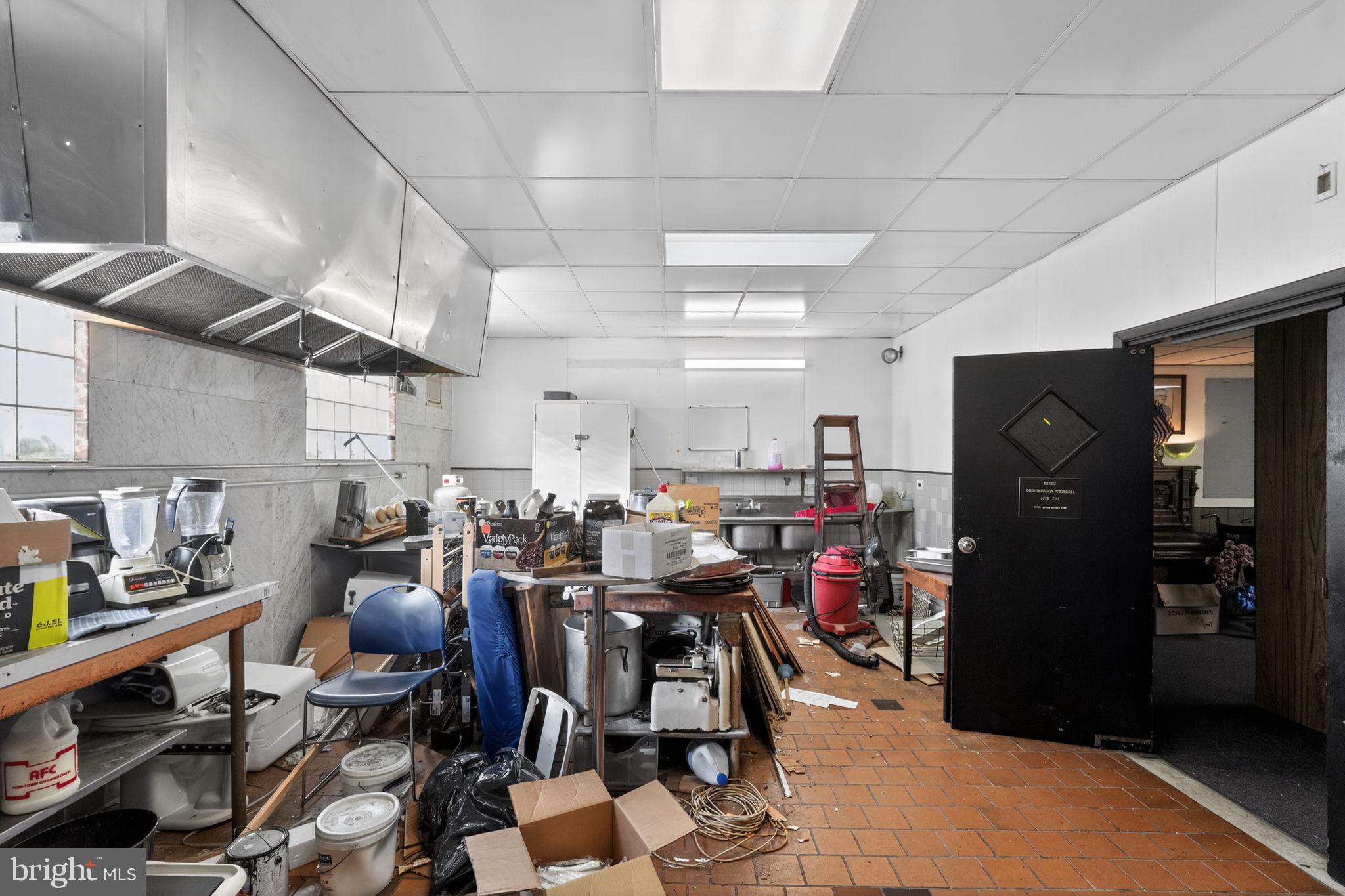 6600 Ridge Avenue Philadelphia, PA 19128 - Photo 18 of 47 a kitchen with lots of appliances and furniture