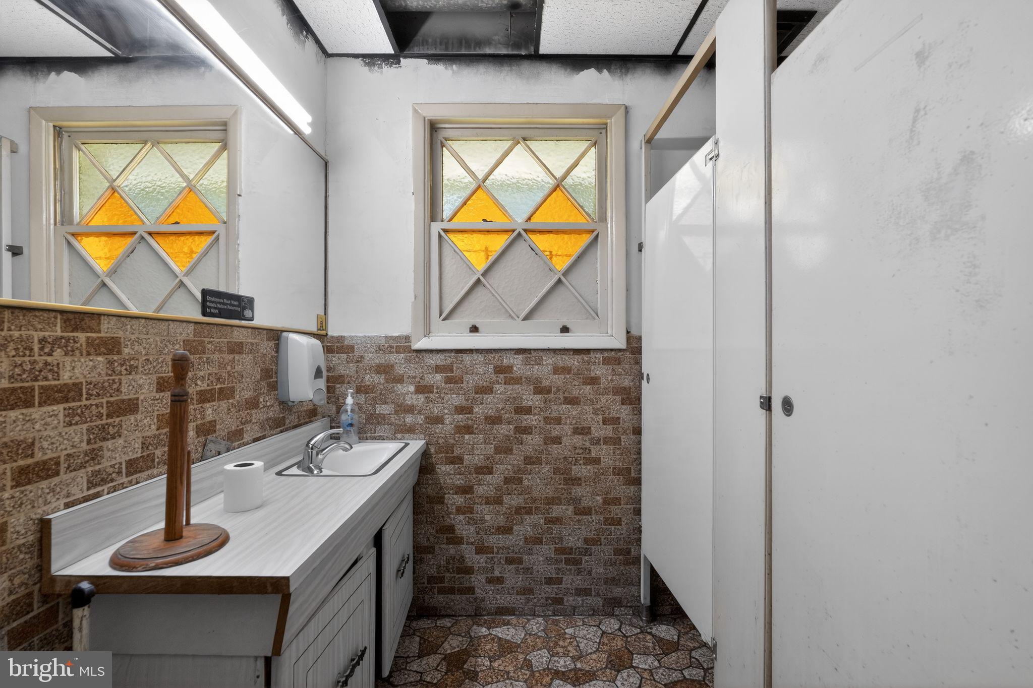 6600 Ridge Avenue Philadelphia, PA 19128 - Photo 19 of 47 a bathroom with a sink and a mirror