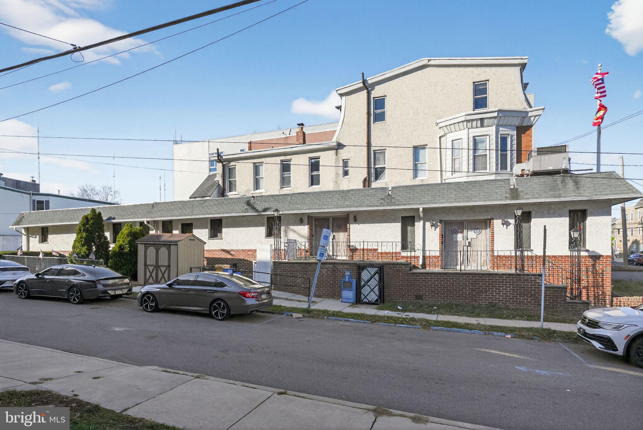 6600 Ridge Avenue Philadelphia, PA 19128 - Photo 2 of 47 a car parked in front of a building