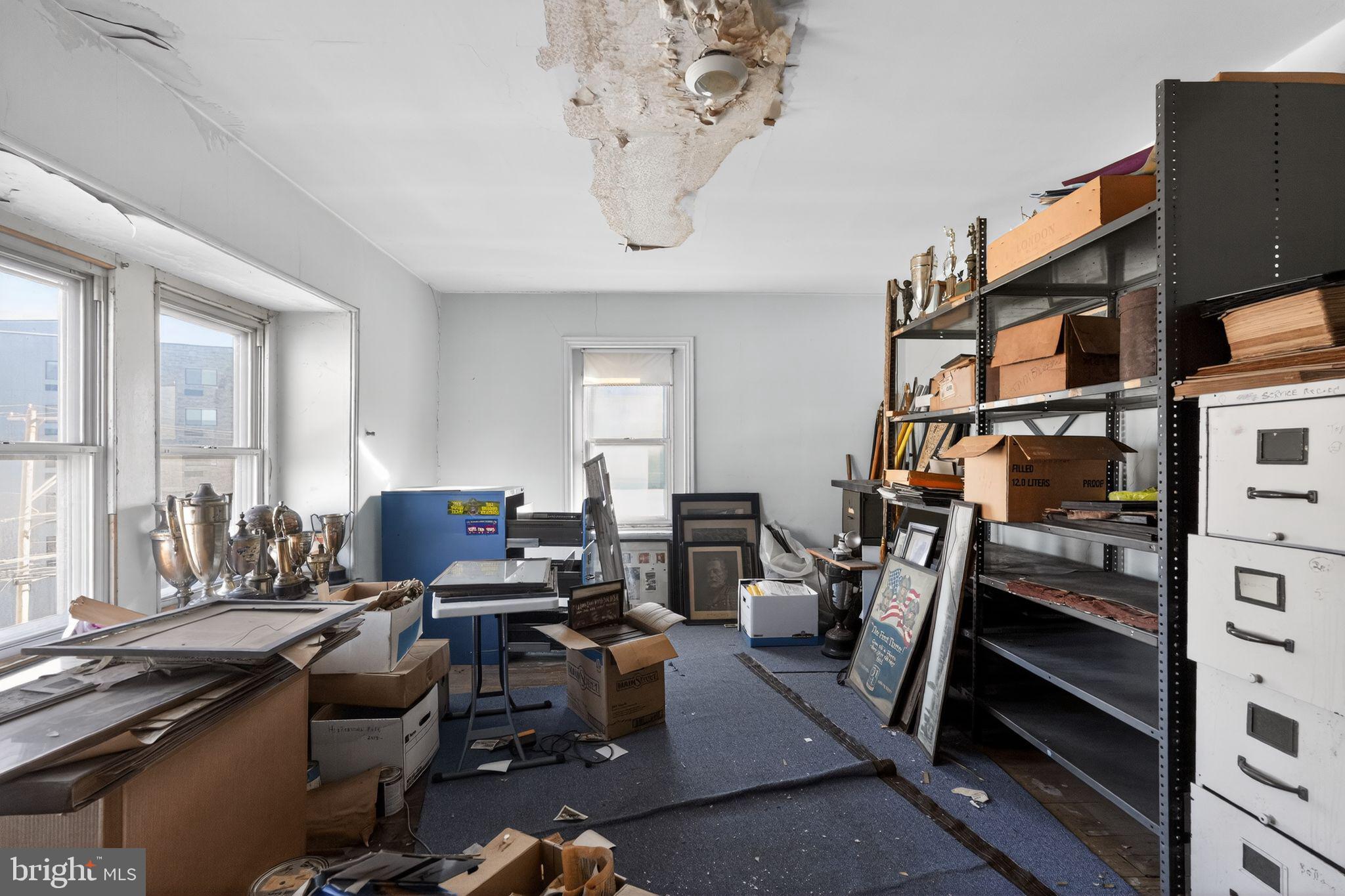 6600 Ridge Avenue Philadelphia, PA 19128 - Photo 27 of 47 a view of a livingroom with workspace and a window