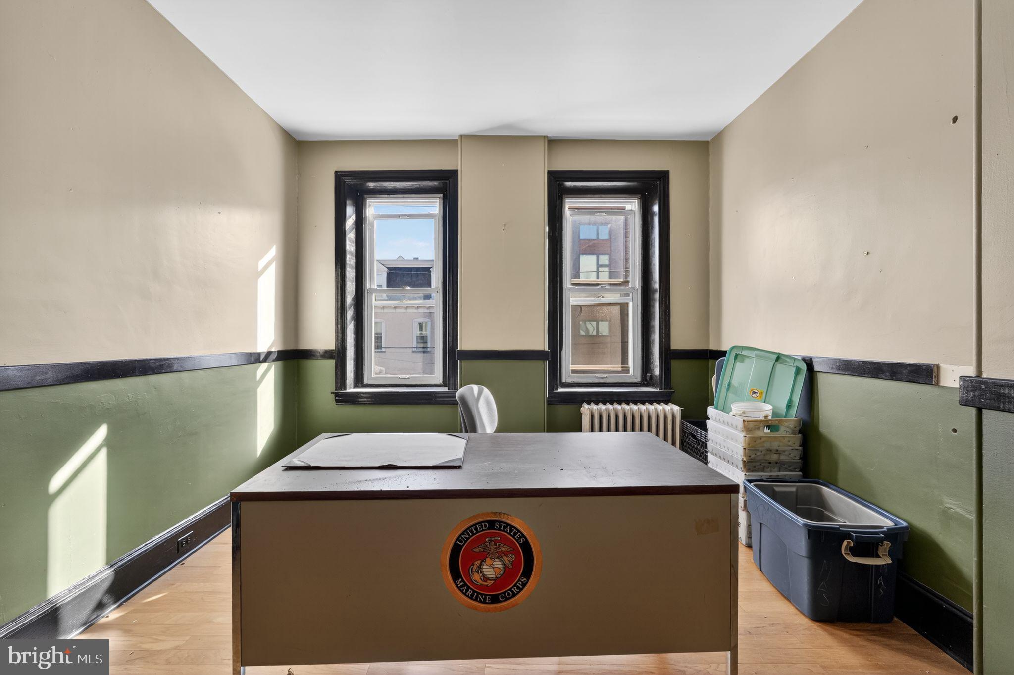 6600 Ridge Avenue Philadelphia, PA 19128 - Photo 36 of 47 a kitchen with a sink and a stove top oven with wooden floor