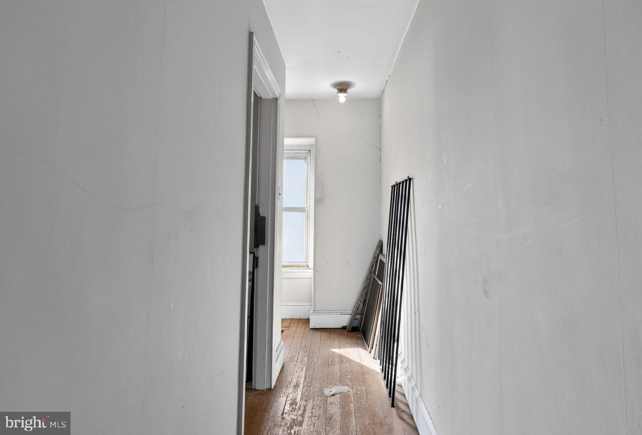 6600 Ridge Avenue Philadelphia, PA 19128 - Photo 39 of 47 wooden floor in a gallery with a mirror