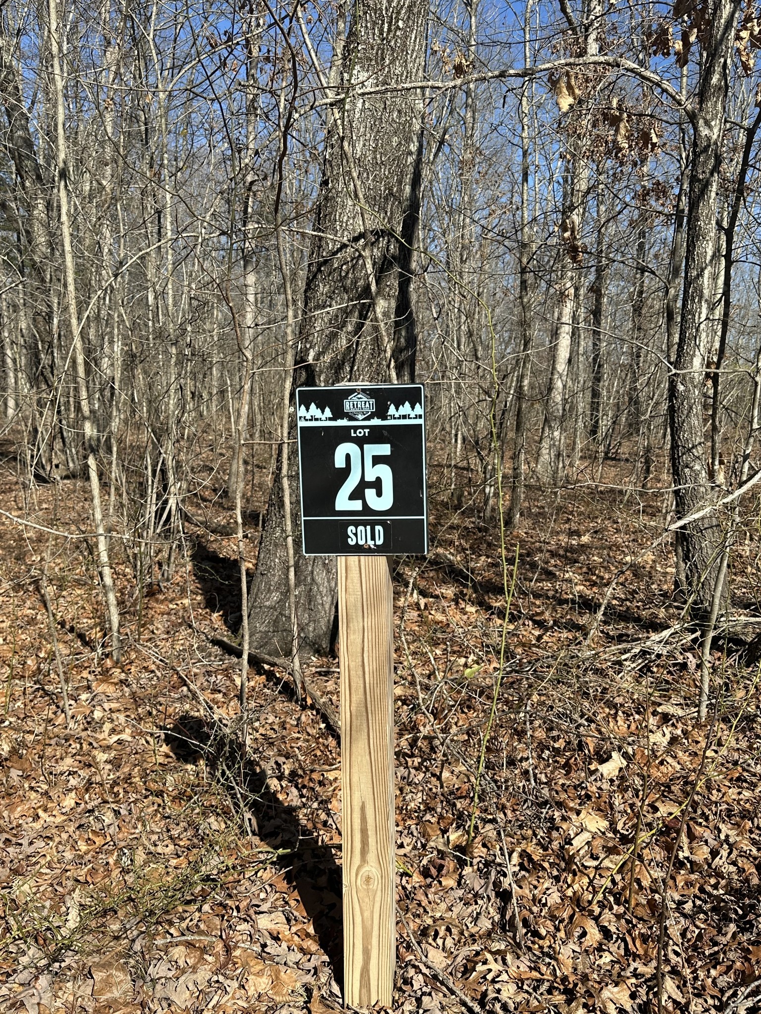 222 Sunset Blf Way Monteagle, TN 37356 - Photo 2 of 8 a sign board with a yard