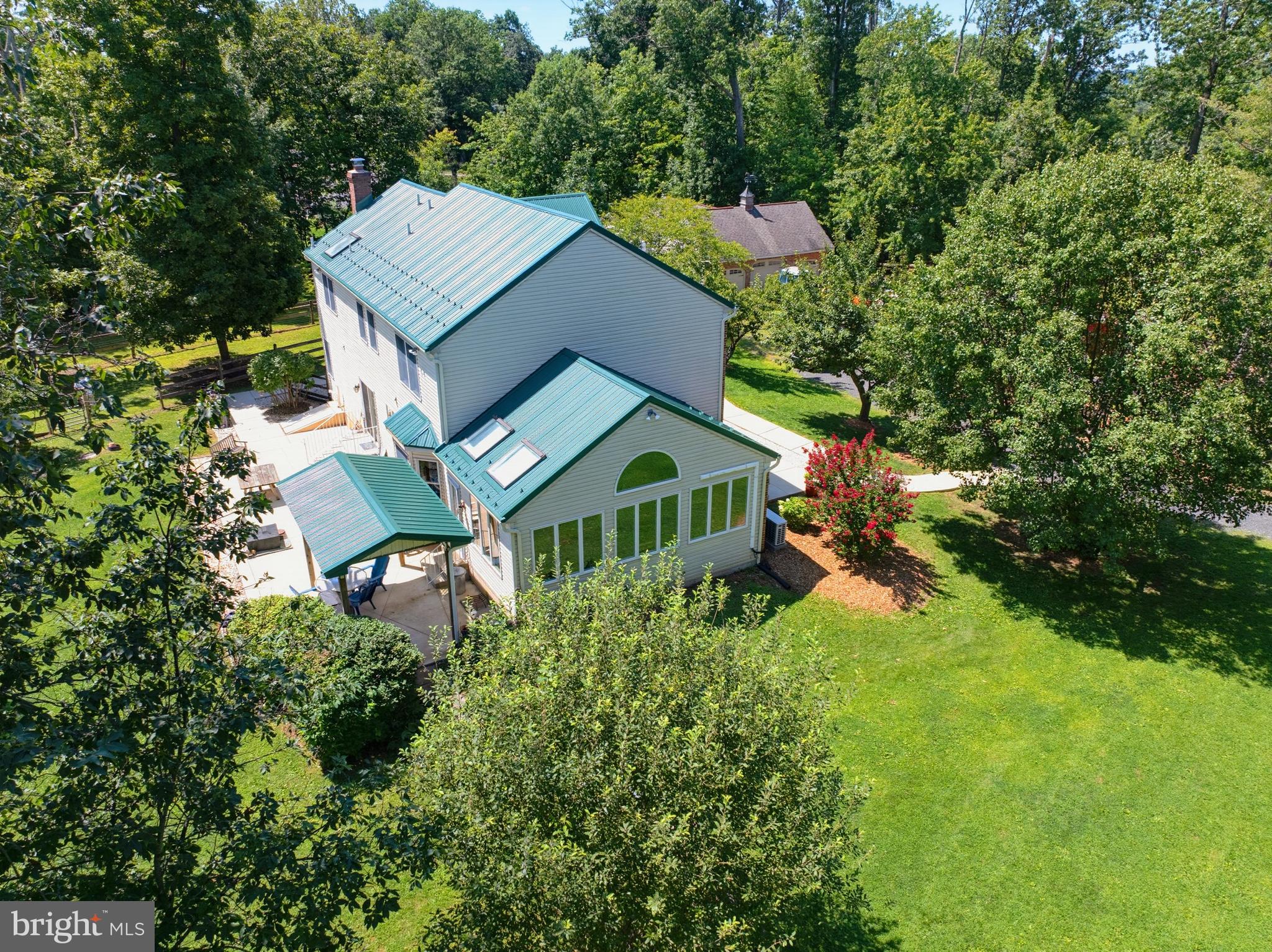 824 Welcome House Road Perkasie, PA 18944 - Photo 5 of 27 Exterior view of Sunroom & Covered eating/grill a