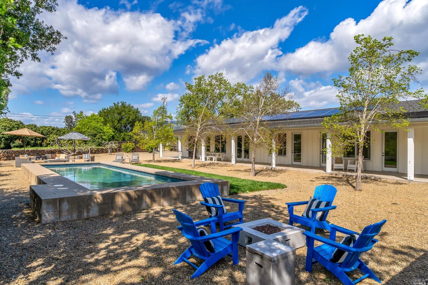 18304 Carriger Road Sonoma, CA 95476 - Photo 1 of 1 a view of a house with swimming pool and sitting area
