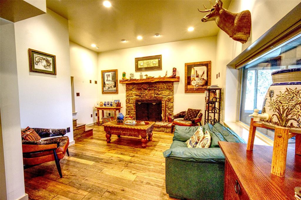 2525 Dodson Pr Road Gordon, TX 76453 - Photo 11 of 31 a living room with furniture and a fireplace