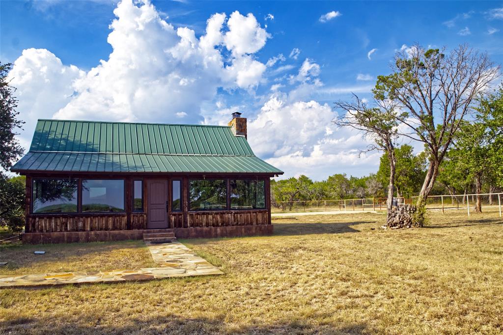 2525 Dodson Pr Road Gordon, TX 76453 - Photo 25 of 31 a view of a house with a yard