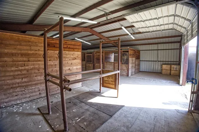 a view of a room with wooden walls