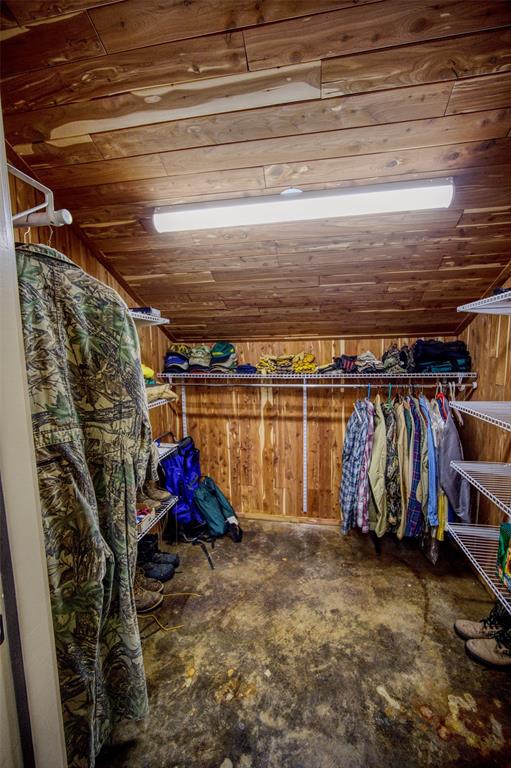 2525 Dodson Pr Road Gordon, TX 76453 - Photo 10 of 31 a view of walk in closet with clothes