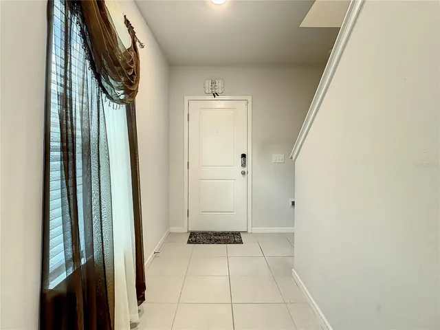a kitchen with stainless steel appliances a stove microwave and sink
