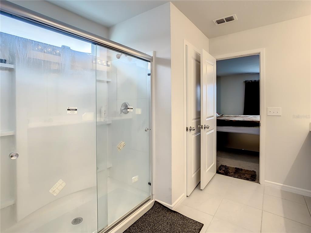 30344 Marquette Avenue Wesley Chapel, FL 33545 - Photo 45 of 71 a view of an empty walk in closet and closet