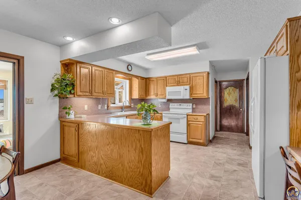 $359,900 | 3342 Southwest Friar Road, Topeka, KS 66614