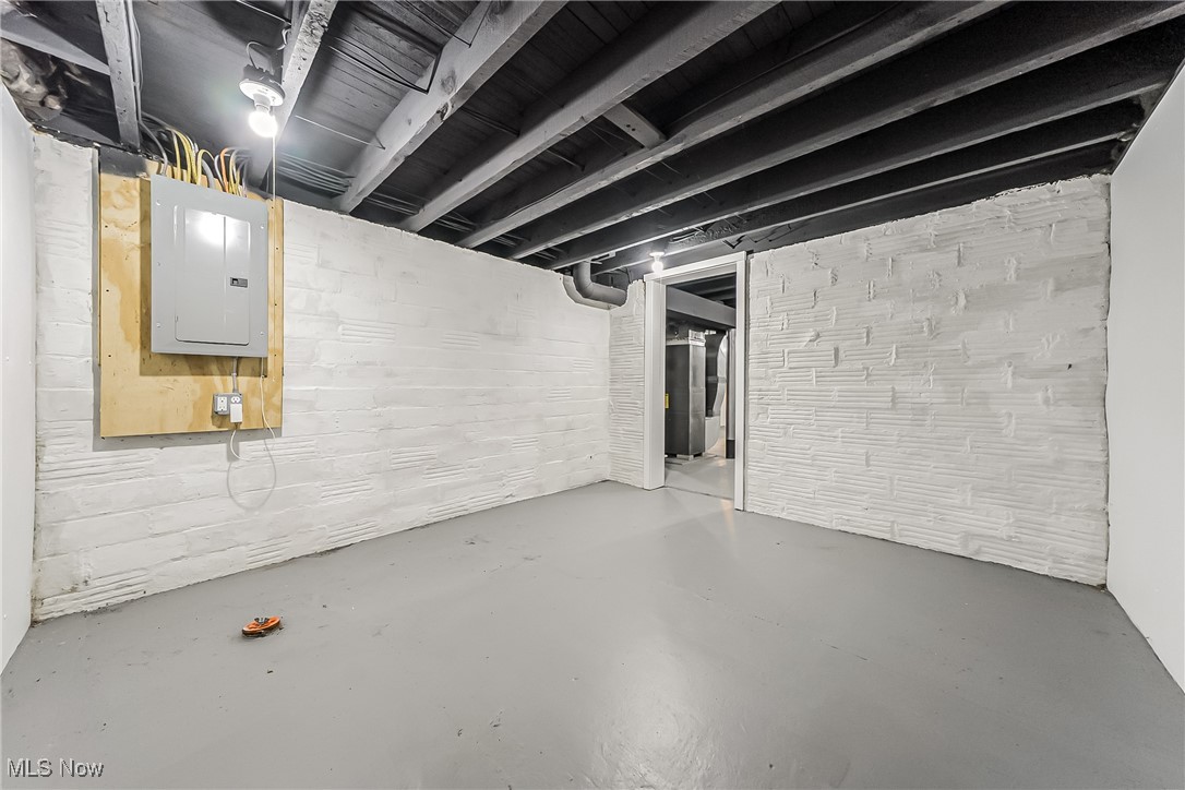 1240 Dorsh Road Cleveland, OH 44121 - Photo 29 of 36 Unfinished basement with electric panel