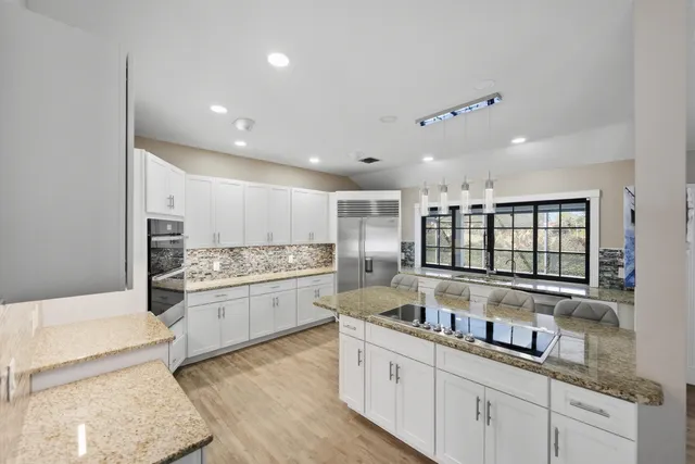 a view of roof deck with lounge chair