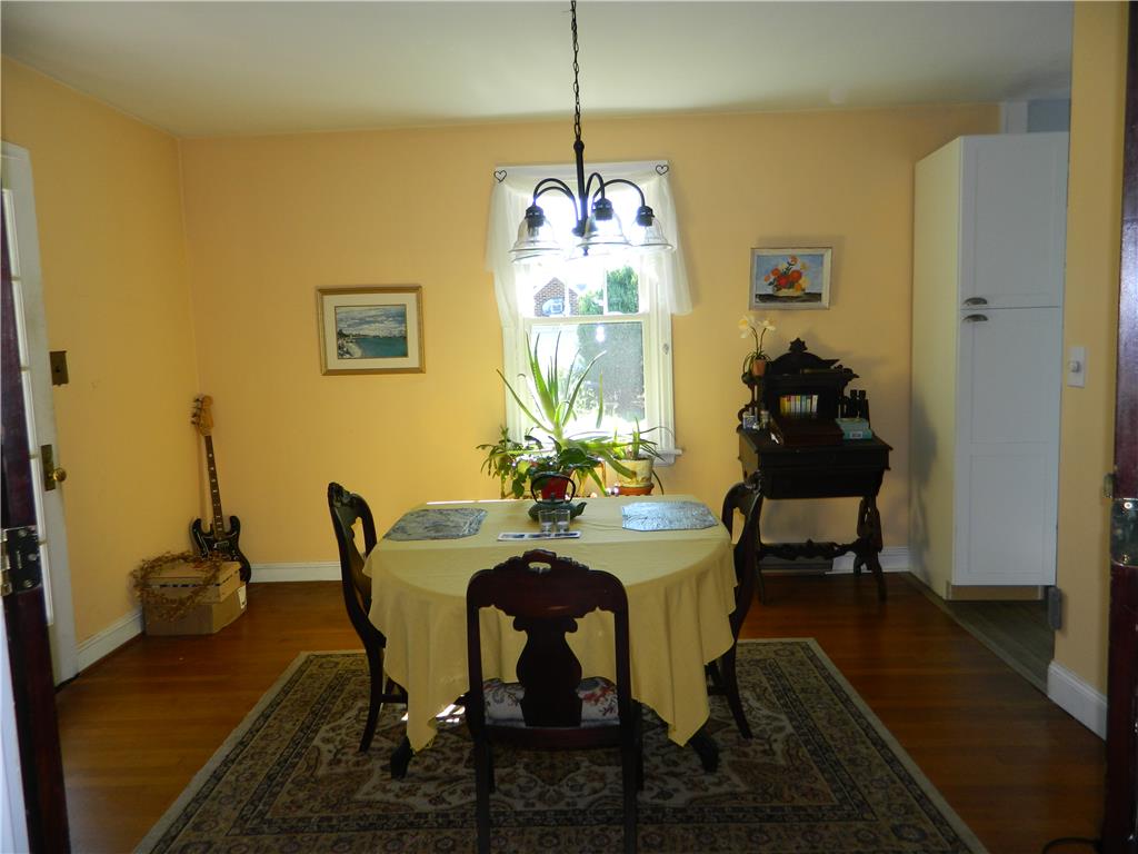 2130 Huntington Street Bethlehem, PA 18017 - Photo 7 of 23 A welcoming dining space presents warm wood flooring and a classic chandelier for timeless appeal.