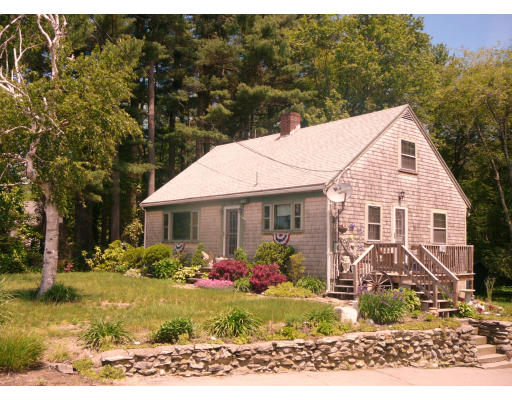 75 Holmes Street Halifax, MA 02338 - Photo 14 of 29 a view of a house next to a yard