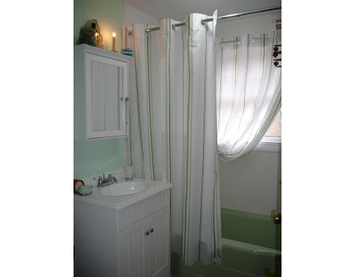 75 Holmes Street Halifax, MA 02338 - Photo 18 of 29 a bathroom with a shower and a sink