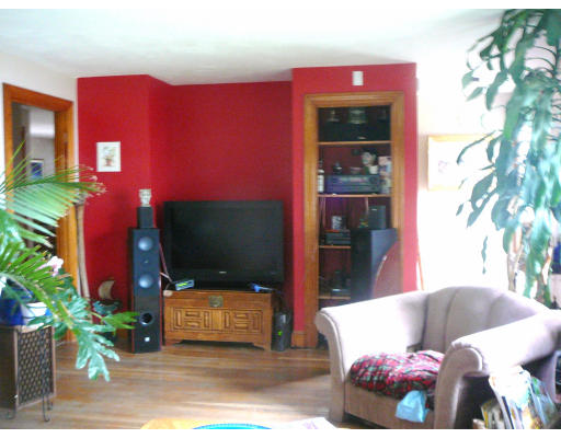 75 Holmes Street Halifax, MA 02338 - Photo 19 of 29 a living room with furniture and a flat screen tv