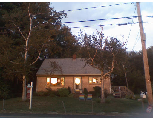 75 Holmes Street Halifax, MA 02338 - Photo 2 of 29 a view of a small yard