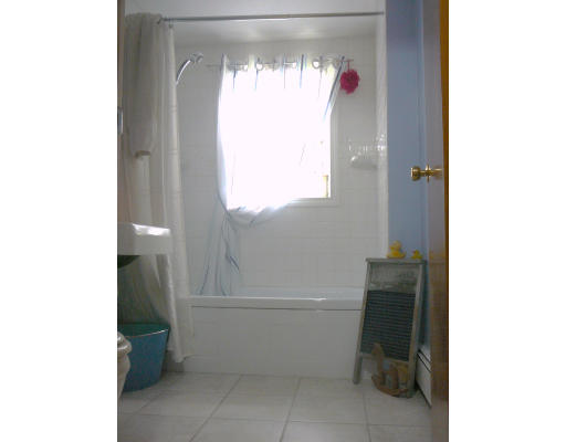75 Holmes Street Halifax, MA 02338 - Photo 21 of 29 a bathroom with a toilet and a sink