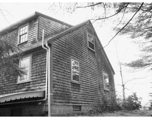 75 Holmes Street Halifax, MA 02338 - Photo 23 of 29 a view of a house with a yard