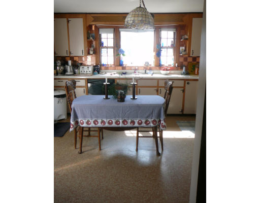 75 Holmes Street Halifax, MA 02338 - Photo 9 of 29 a dining room with furniture and window