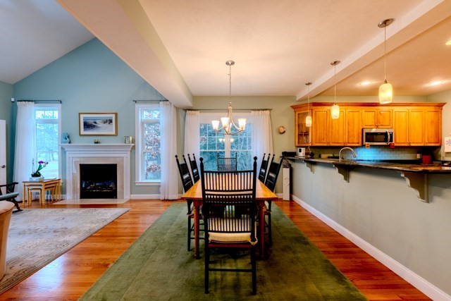 16 Fairway Drive, Unit 16 Topsfield, MA 01983 - Photo 13 of 31 a living room with furniture and a fireplace
