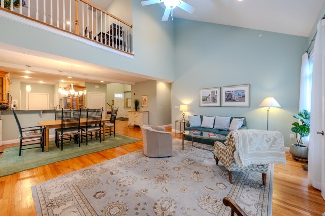 16 Fairway Drive, Unit 16 Topsfield, MA 01983 - Photo 16 of 31 a living room with furniture a pool table and a fireplace