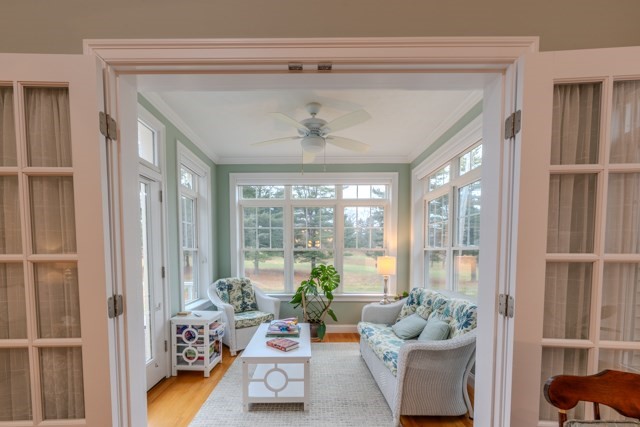16 Fairway Drive, Unit 16 Topsfield, MA 01983 - Photo 17 of 31 a living room with furniture and a large window