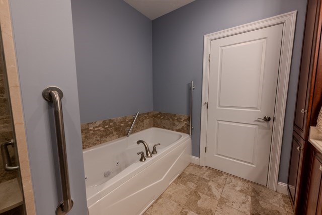 16 Fairway Drive, Unit 16 Topsfield, MA 01983 - Photo 23 of 31 a bathroom with a bathtub and shower