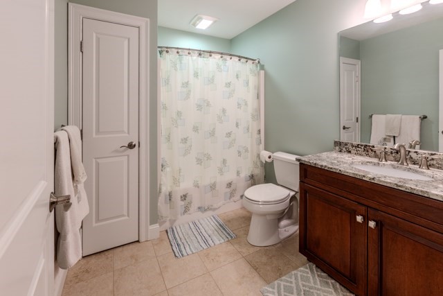16 Fairway Drive, Unit 16 Topsfield, MA 01983 - Photo 27 of 31 a bathroom with a granite countertop sink toilet and shower