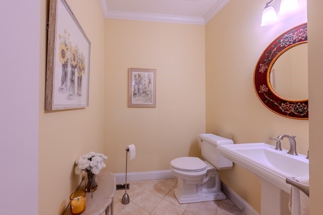 16 Fairway Drive, Unit 16 Topsfield, MA 01983 - Photo 7 of 31 a bathroom with a toilet and a mirror