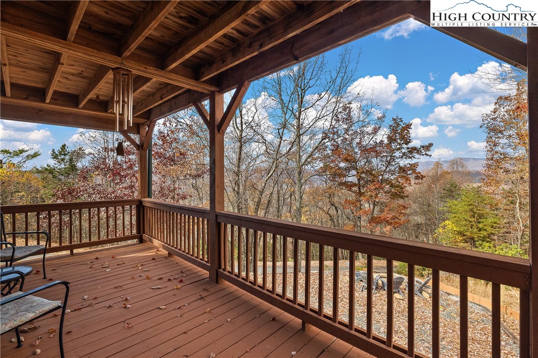 2935 Buck Mountain Road Purlear, NC 28665 - Photo 1 of 49 a view of a porch with wooden floor
