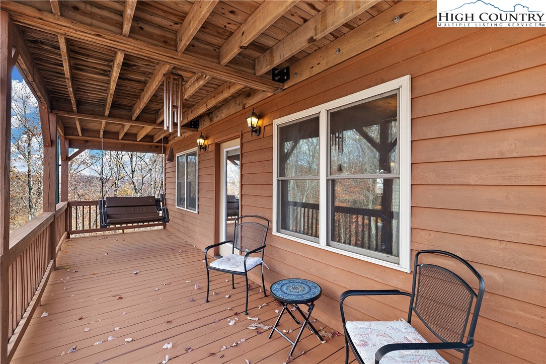 2935 Buck Mountain Road Purlear, NC 28665 - Photo 15 of 49 a view of a chairs in the balcony