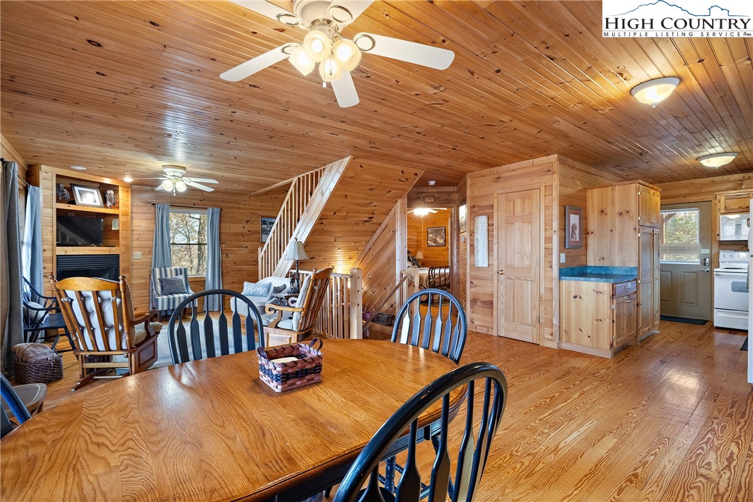 2935 Buck Mountain Road Purlear, NC 28665 - Photo 17 of 49 a view of a dining room with furniture