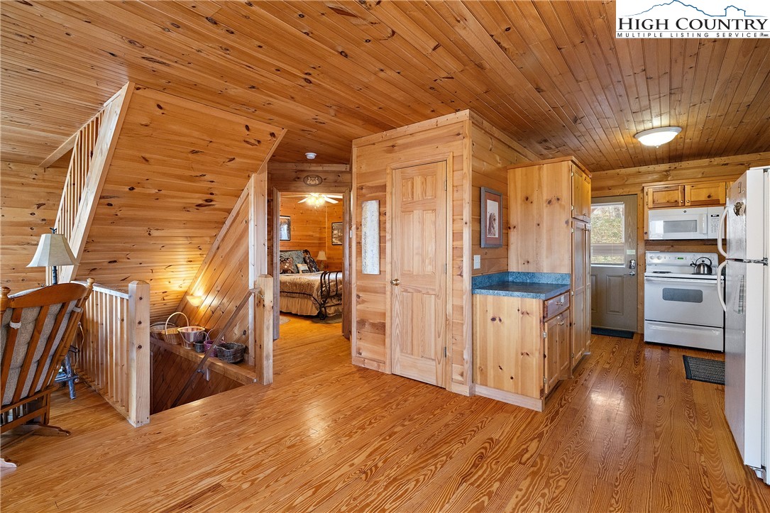 2935 Buck Mountain Road Purlear, NC 28665 - Photo 18 of 49 a view of a hallway with the wooden floor