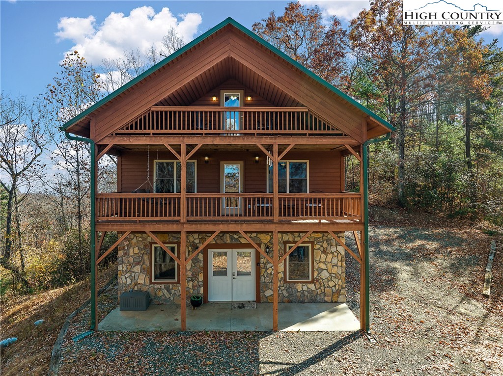 2935 Buck Mountain Road Purlear, NC 28665 - Photo 43 of 49 a front view of a house with yard
