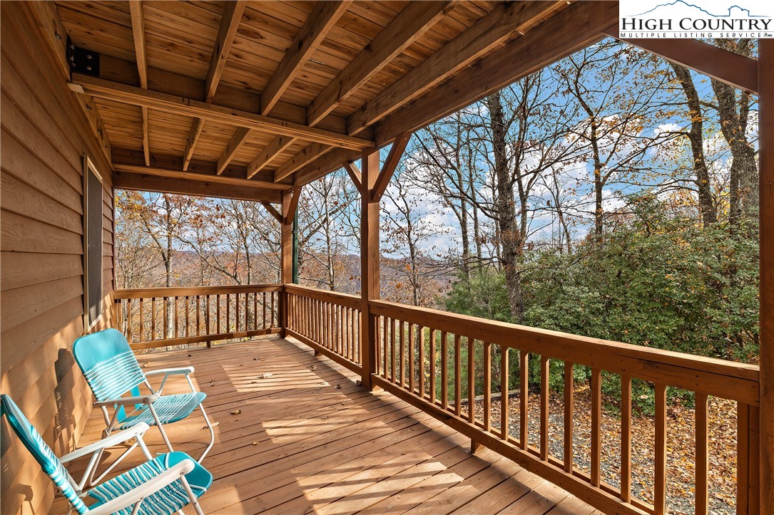 2935 Buck Mountain Road Purlear, NC 28665 - Photo 5 of 49 a view of a two chair in the balcony