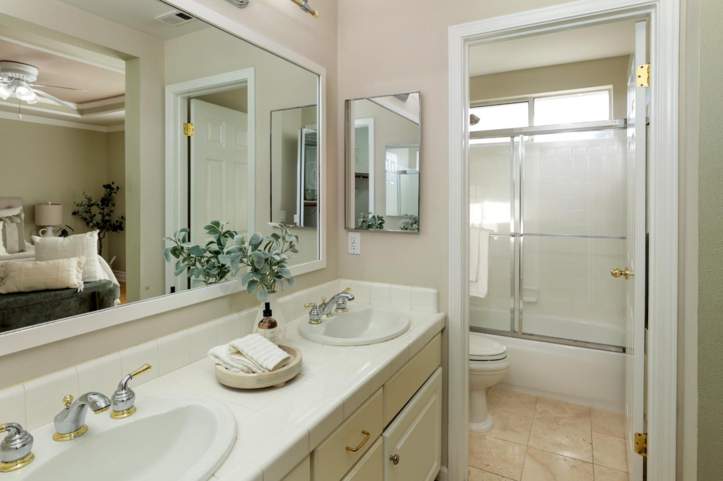491 Villa Street Mountain View, CA 94041 - Photo 14 of 19 a bathroom with a granite countertop sink toilet and shower