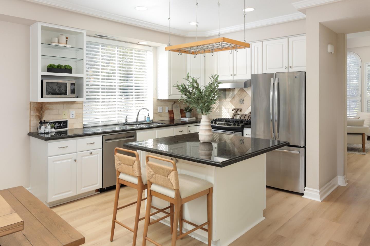 491 Villa Street Mountain View, CA 94041 - Photo 8 of 19 a kitchen with stainless steel appliances granite countertop a refrigerator a sink a stove and cabinets