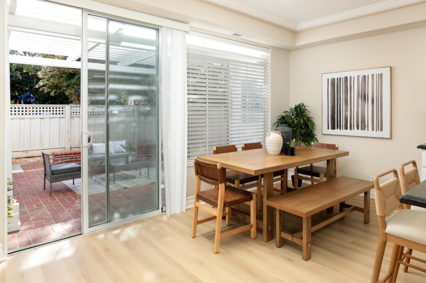 491 Villa Street Mountain View, CA 94041 - Photo 9 of 19 a living room with a table and a potted plant
