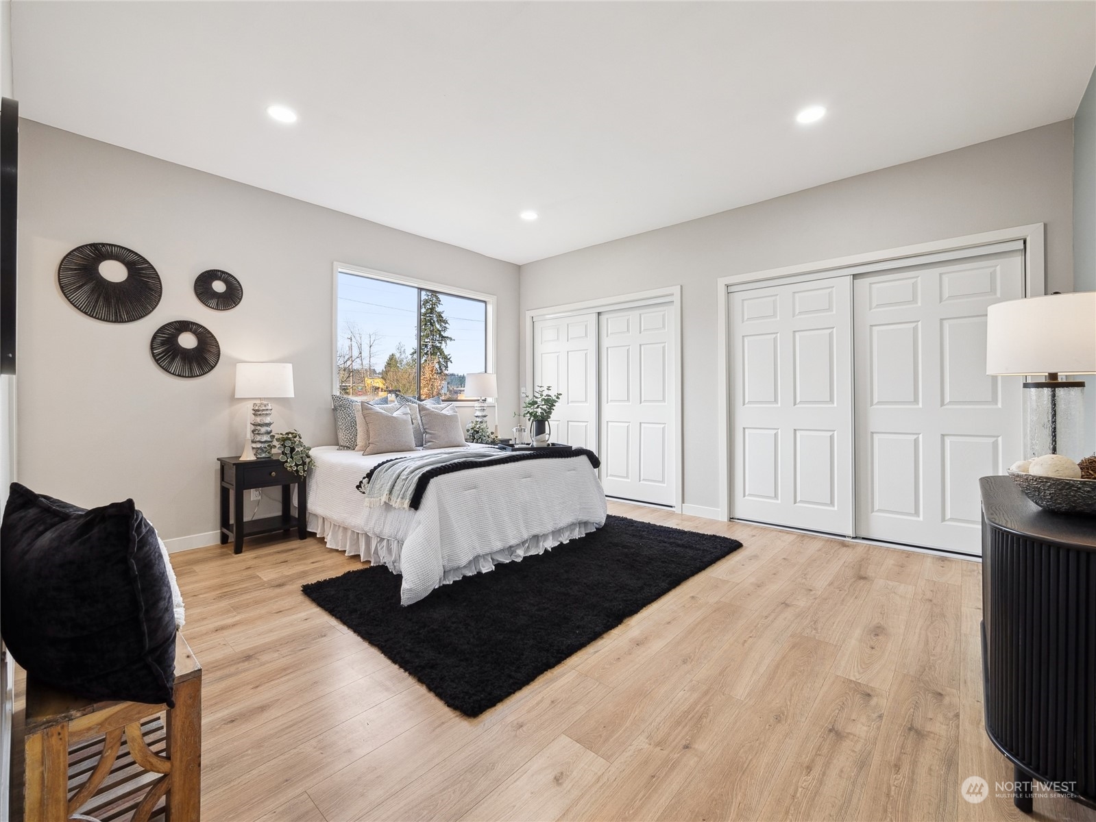 1502 16th Street Sumner, WA 98390 - Photo 14 of 26 a bed room with a bed and a window
