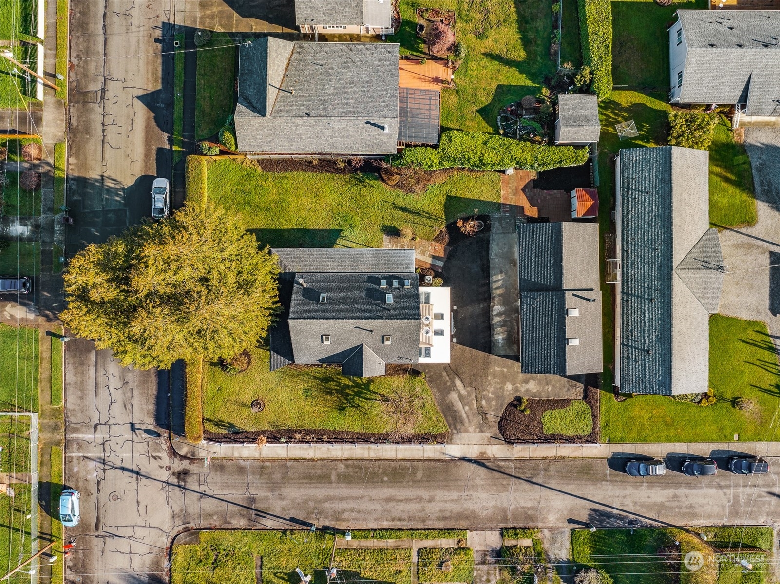 1502 16th Street Sumner, WA 98390 - Photo 5 of 26 an aerial view of a house with a swimming pool