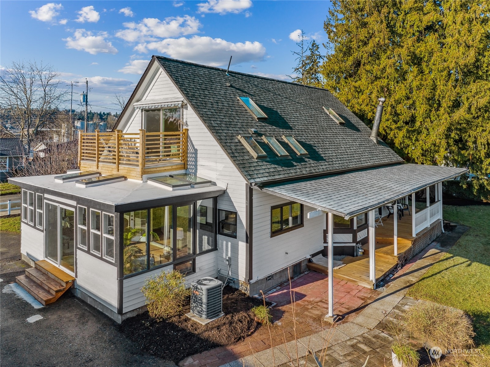 1502 16th Street Sumner, WA 98390 - Photo 6 of 26 a view of a house with a balcony