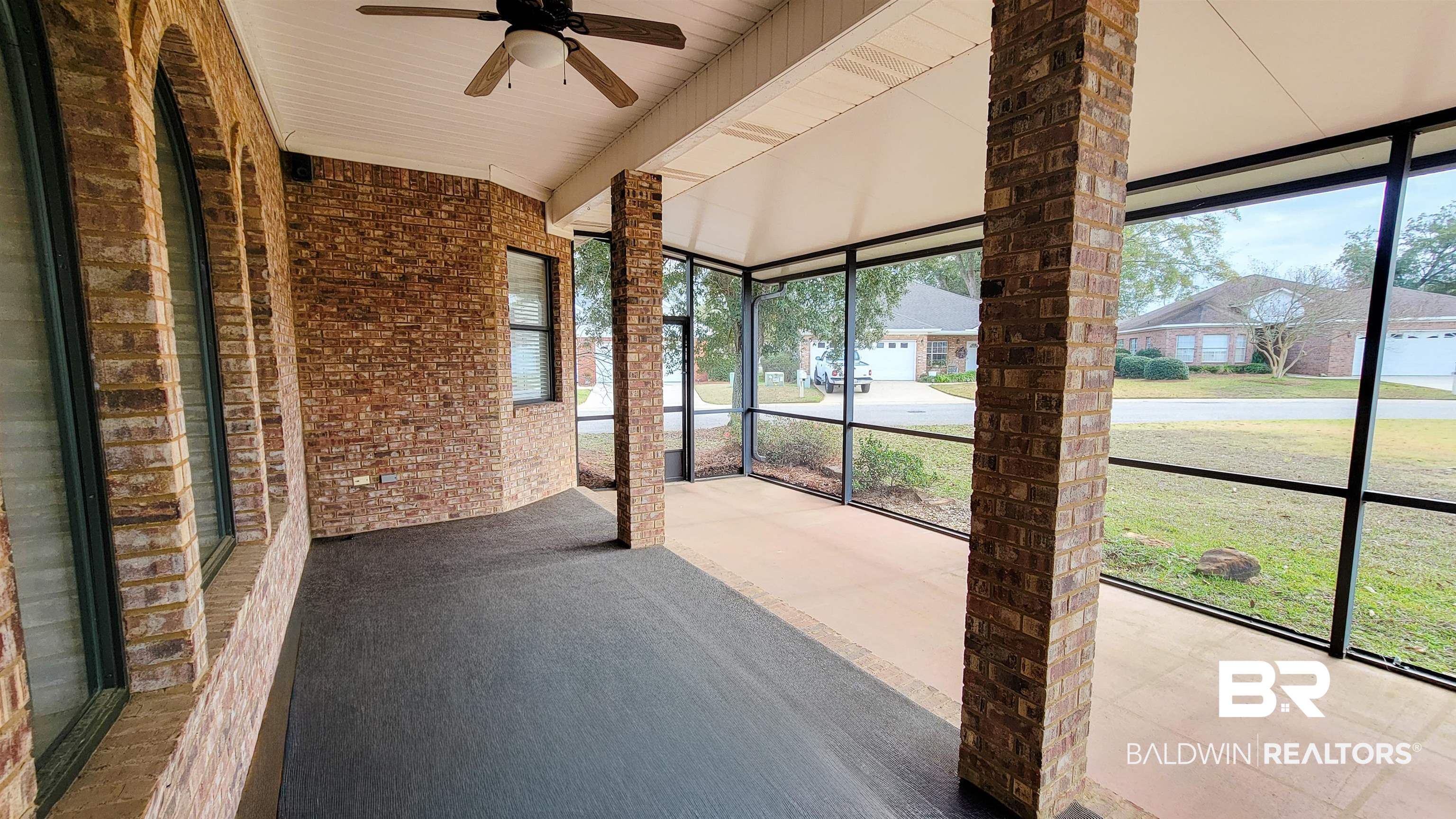 214 Hemingway Loop Foley, AL 36535 - Photo 34 of 67 Unfurnished sunroom with ceiling fan