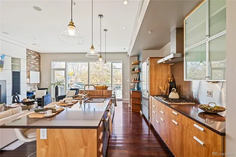 a very nice looking kitchen with a large window