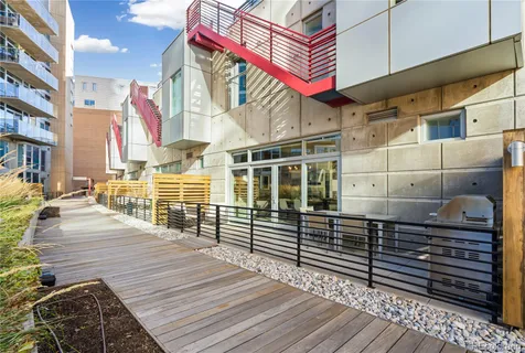 a street sign on a wooden bridge