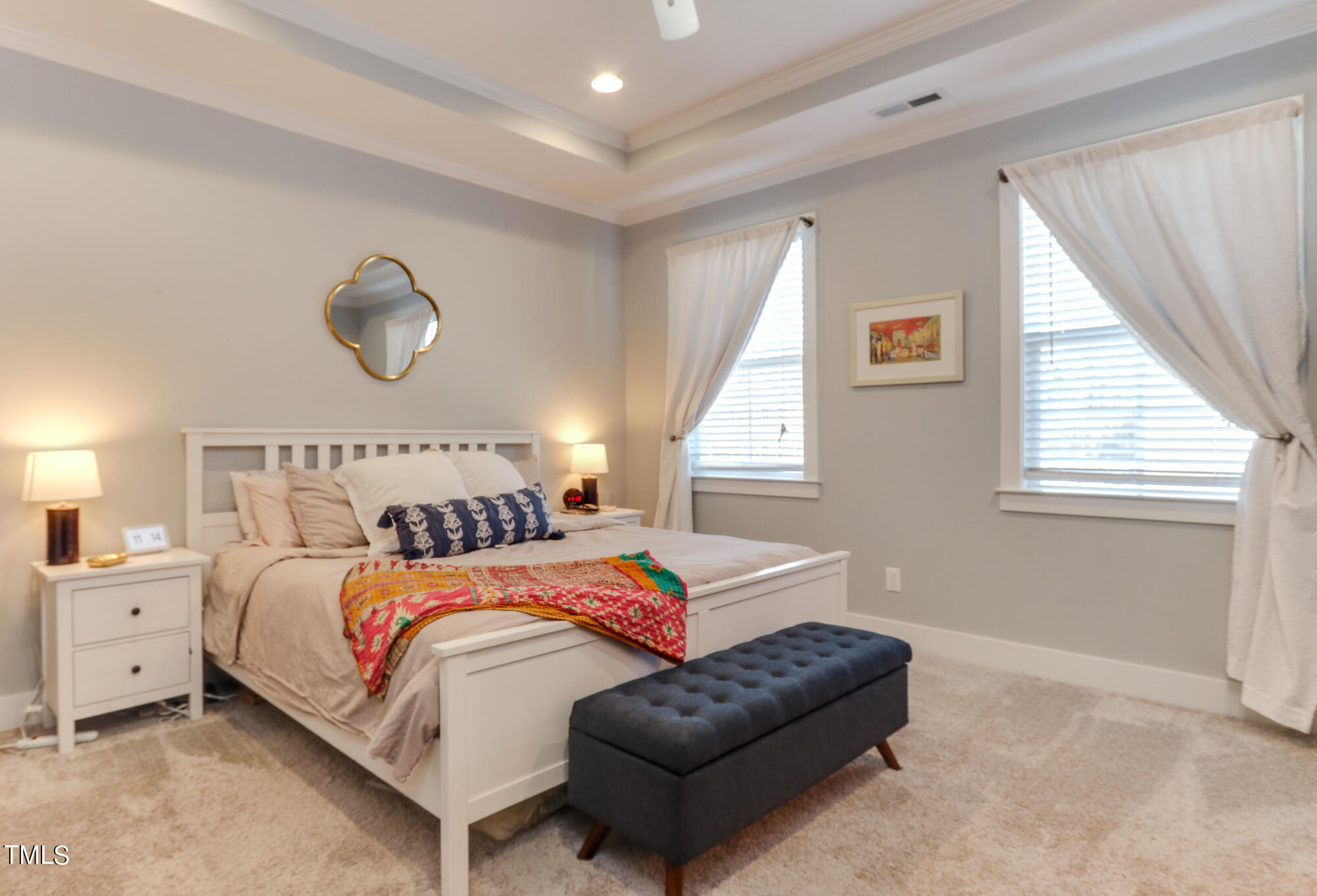 904 Wake Towne Drive Raleigh, NC 27609 - Photo 14 of 30 a bedroom with a bed and window