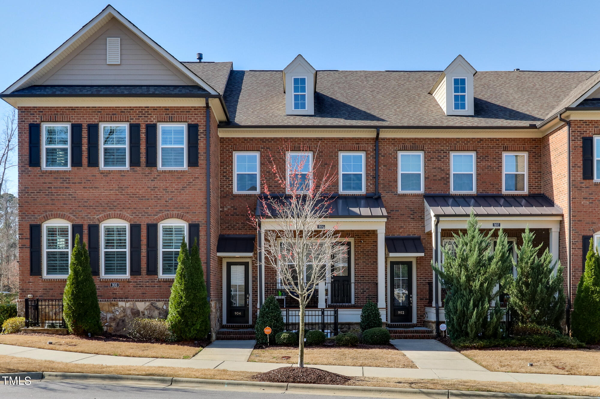 904 Wake Towne Drive Raleigh, NC 27609 - Photo 2 of 30 a front view of a brick house