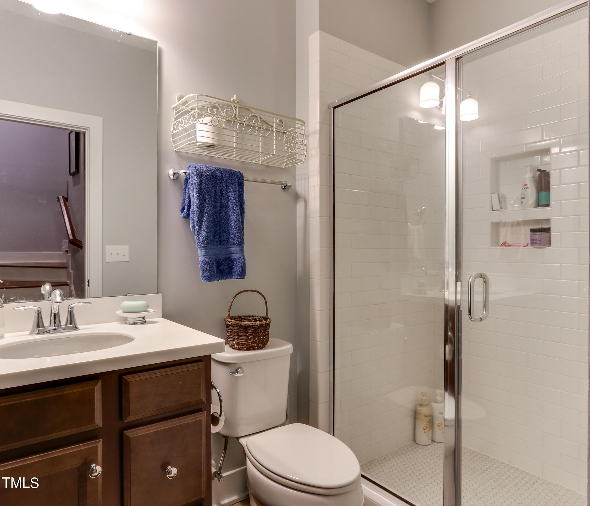 904 Wake Towne Drive Raleigh, NC 27609 - Photo 26 of 30 a bathroom with a sink a toilet and shower